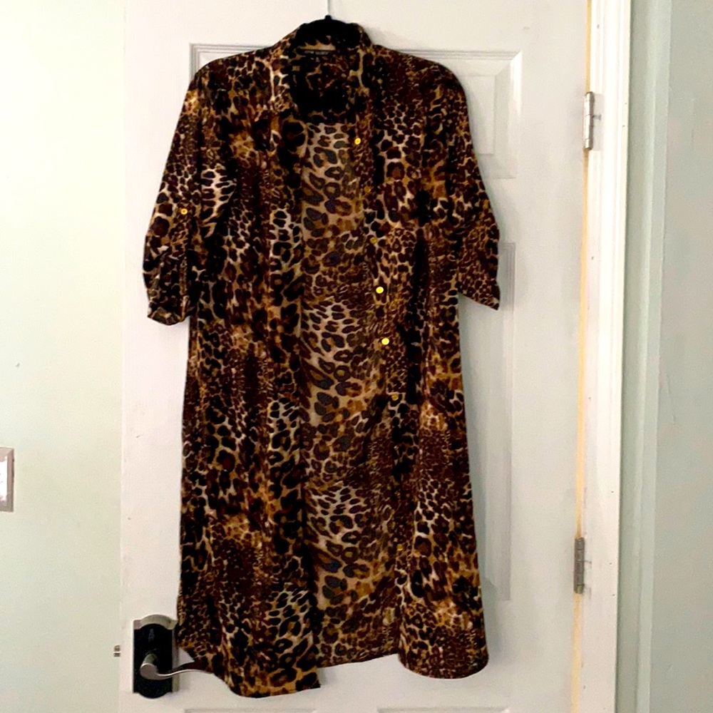 Leopard print blouse, splits on both sides, size small